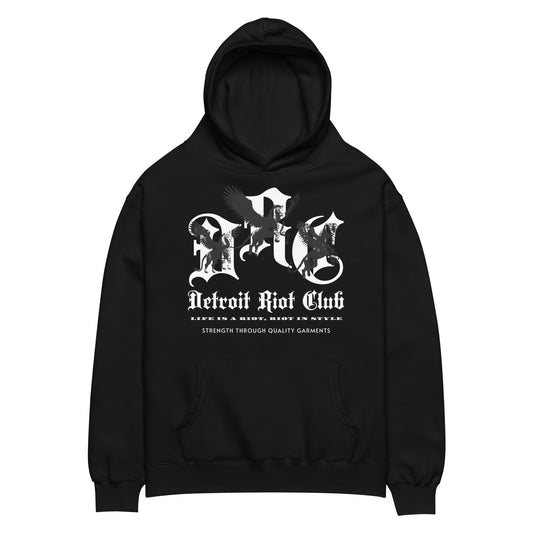 "Flat lay front view of the Detroit Riot Club Legacy Crest Hoodie in Void Black. Features the 'Life's A Riot, Riot In Style' archival graphic and premium 100% cotton face hardware."