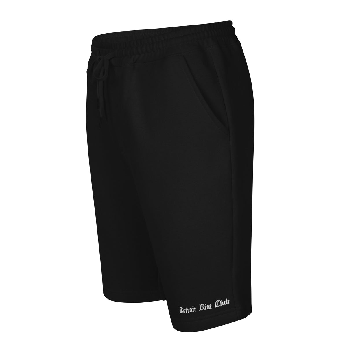 "Front-left silhouette view of the 8.5oz Archival  (Void Black) Jogger Shorts. Showcases the jersey-lined hand pockets and side-seam construction of our premium hardware."