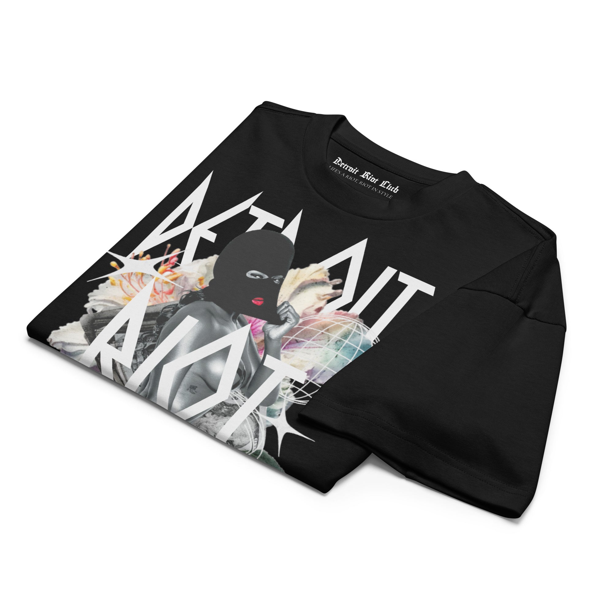 Masked Reality Box Tee – Void Black – Folded flat lay showcasing the heavyweight 7oz combed cotton texture and branded collar detail