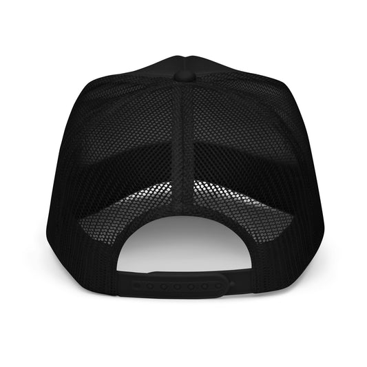 "Rear view of the Detroit Riot Club Motto Foam Trucker in black, showcasing the full mesh back panel and adjustable snapback closure."